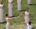 Olympic flame starts its journey to London from ancient birthplace of the Games